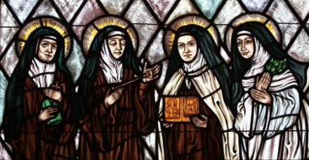 Edith Stein, St Teresa of Avila, St Thérèse of Lisieux and St Catherine of Siena are depicted in a stained-glass window in Montauk, New York (Photo: CNS)