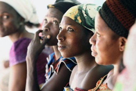 Nigerian women wait for antiretroviral treatment outside a clinic at a Catholic hospital (CNS photo)