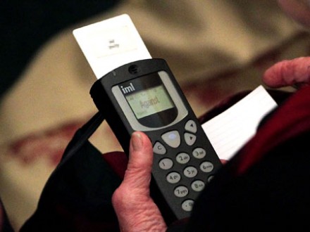 A member of the Synod votes 'no' on their handset (Photo: PA)